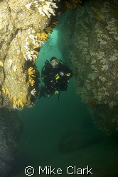 Diver in cave, Eyemouth, Scotland.
Nikon D70, 10.5mm len... by Mike Clark 